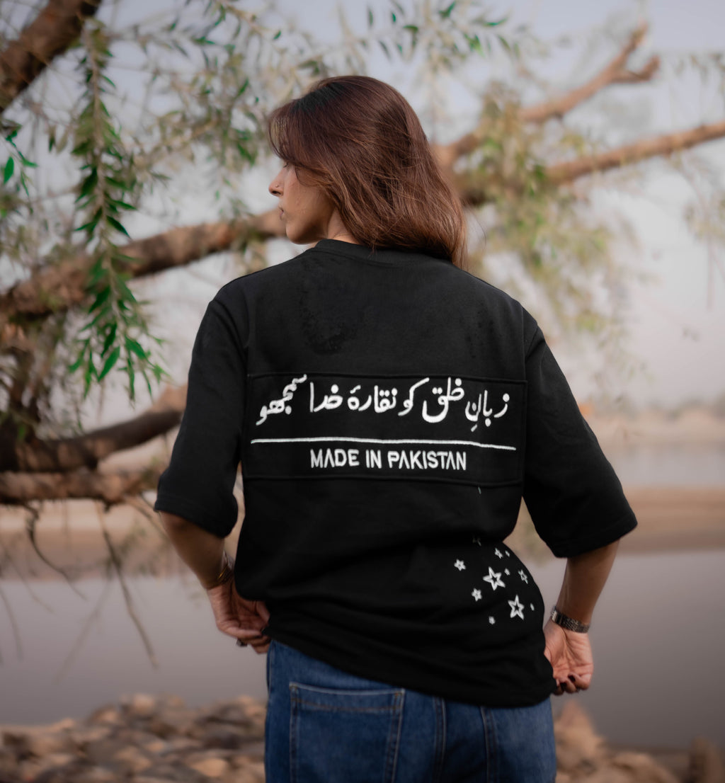 TAAB Statement black oversized t-shirt with Urdu print, back view
