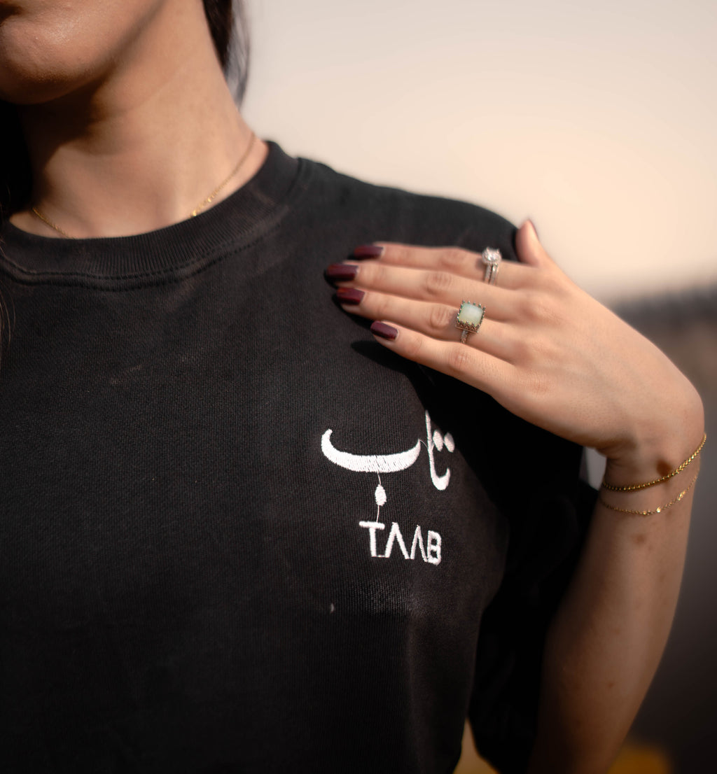 TAAB Statement black oversized t-shirt with Urdu emroidery, model photo 4