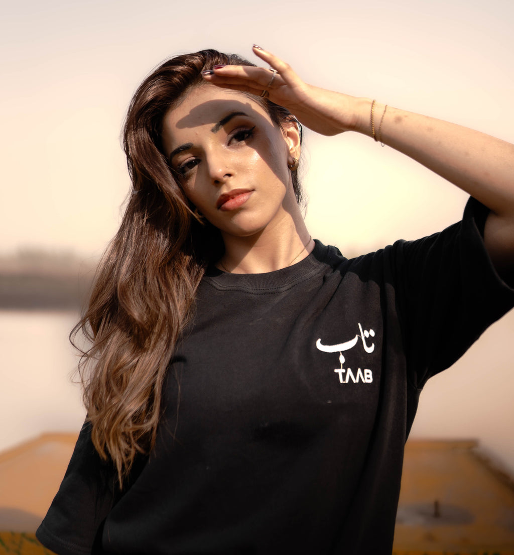 TAAB Statement black oversized t-shirt with Urdu print, model photo 3
